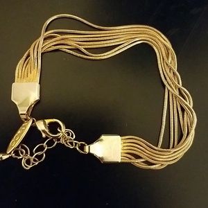 Gold threaded bracelet.